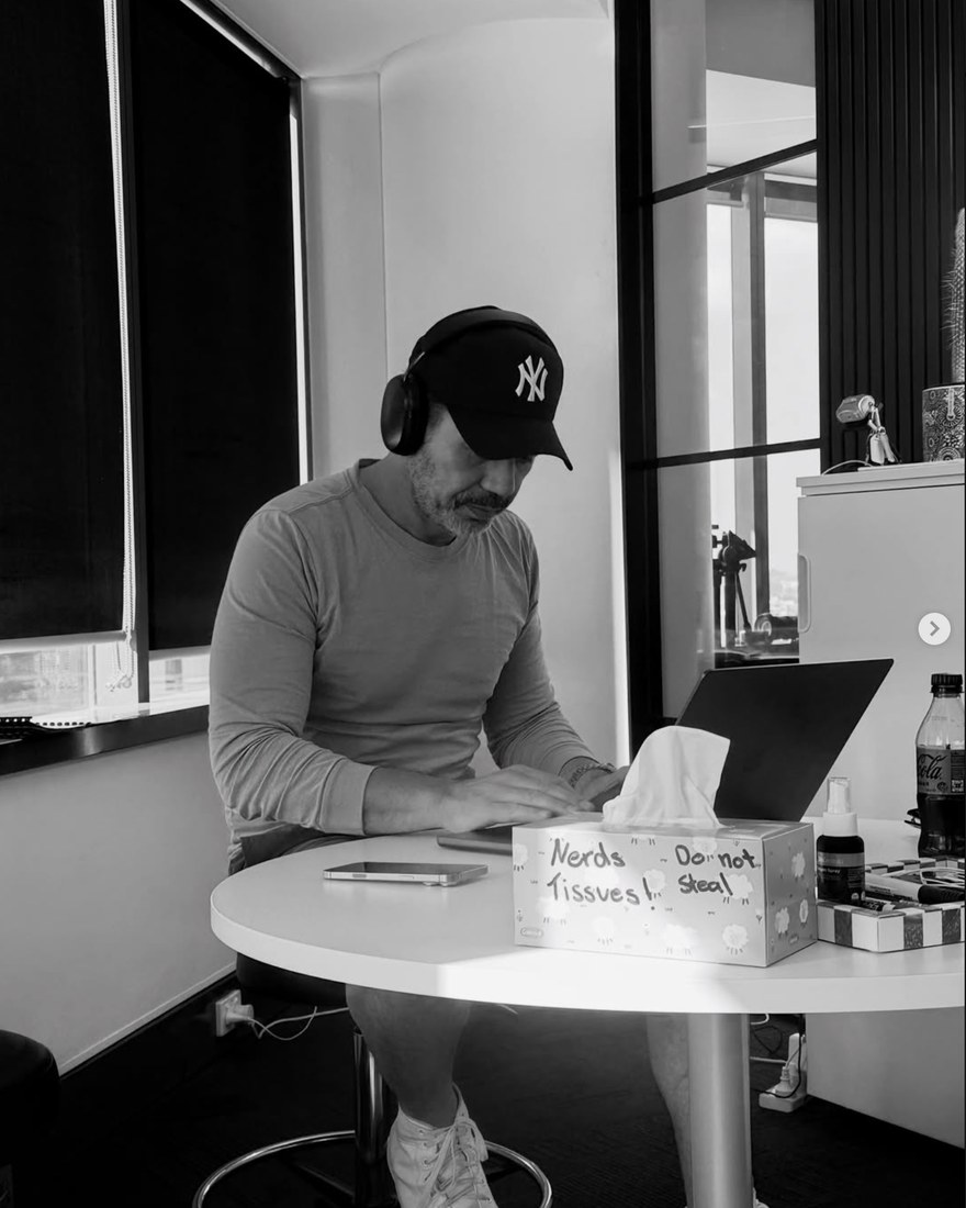 Lawrence Mackey working from the office