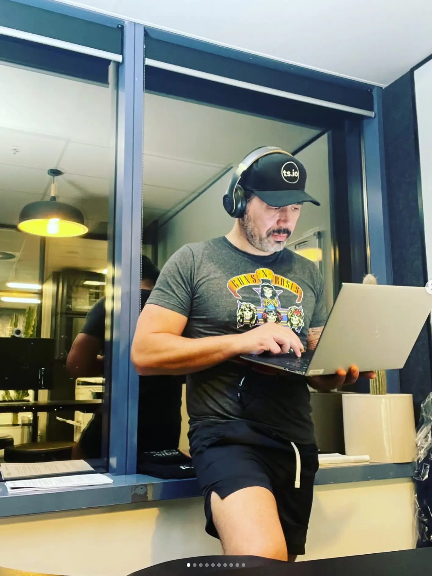 Lawrence Mackey working on his laptop